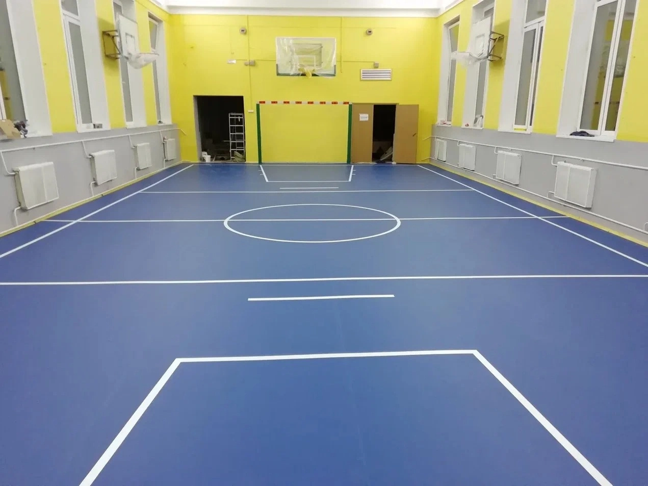 Укладка линолеума в МОУ Гимназия № 1 