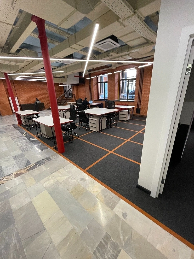 Укладка ковровой плитки в архитектурном бюро 33